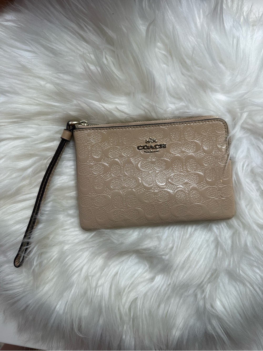 COACH Embossed Signature Wristlet in Neutral Beige